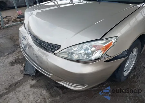 2003 Toyota Camry Le V6 z USA, uszkodzony, nr VIN 4T1BF32K23U056294